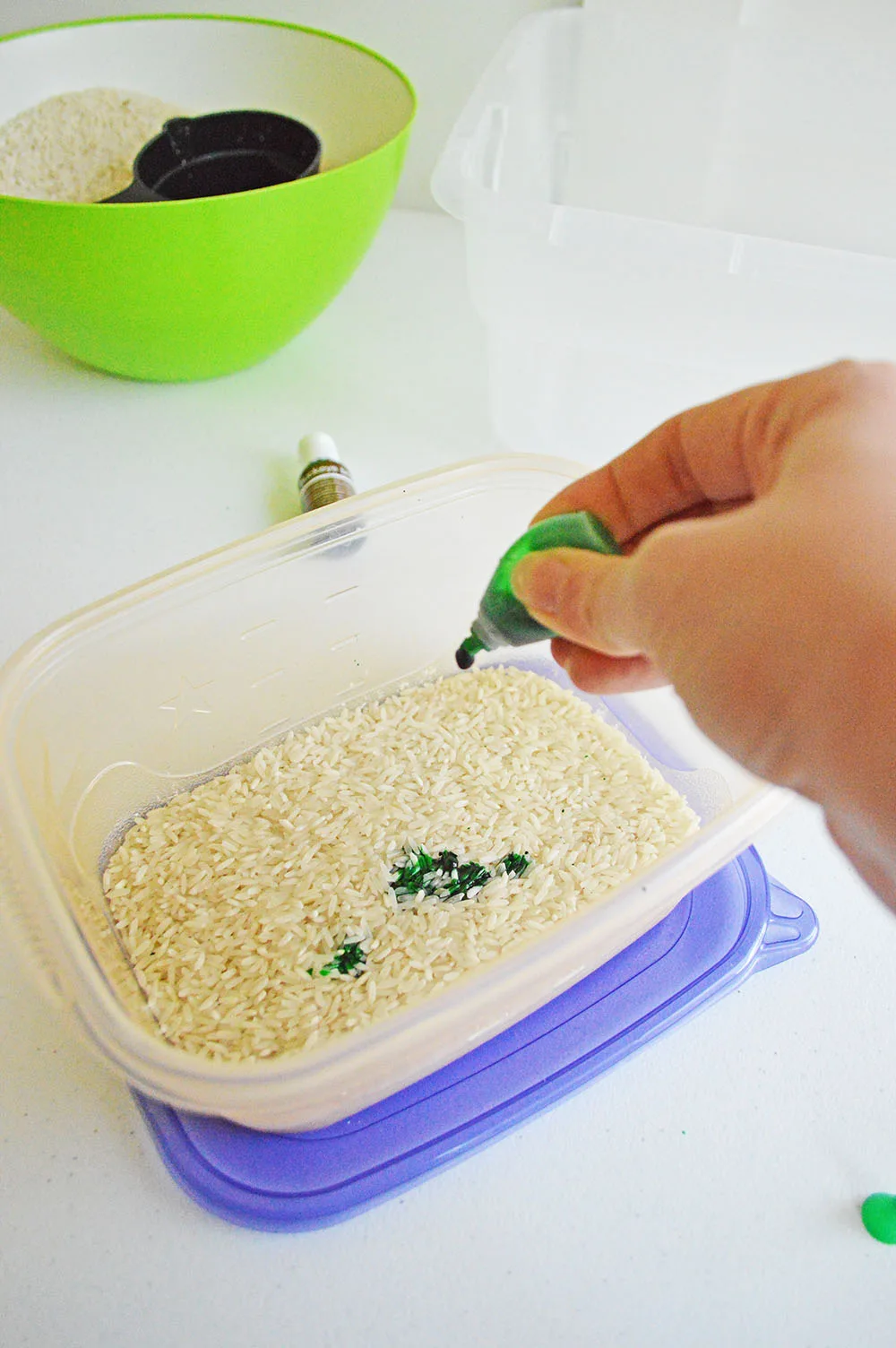 adding food coloring to rice