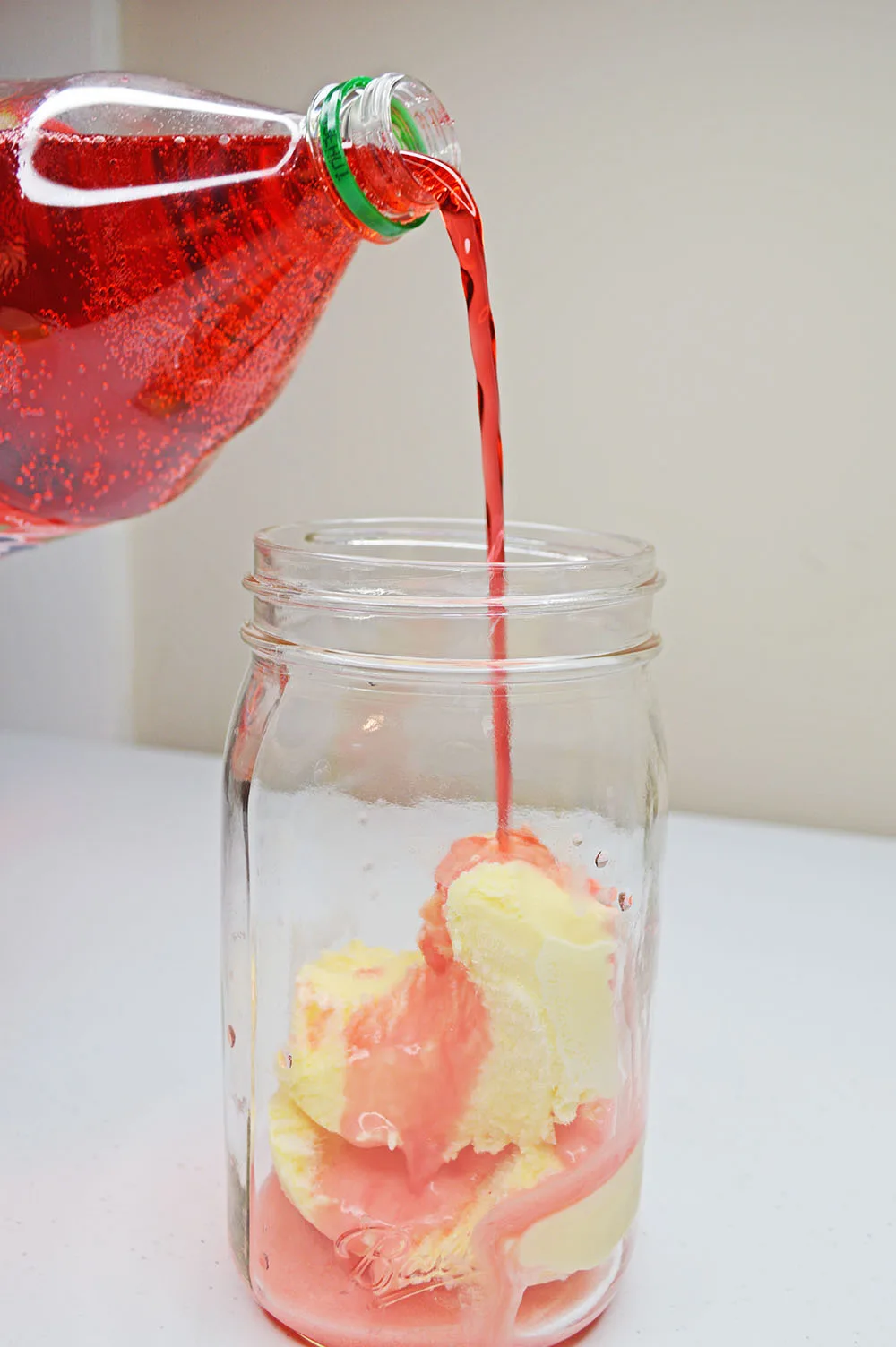 soda pouring into ice cream