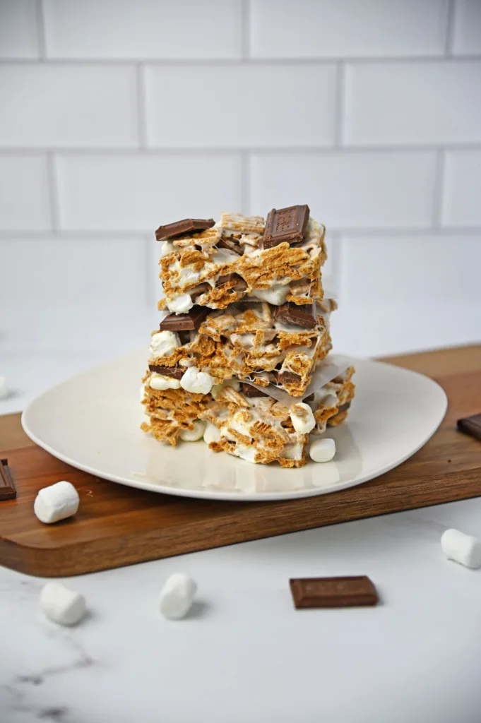 Golden Grahams S'mores Bars stacked on a plate